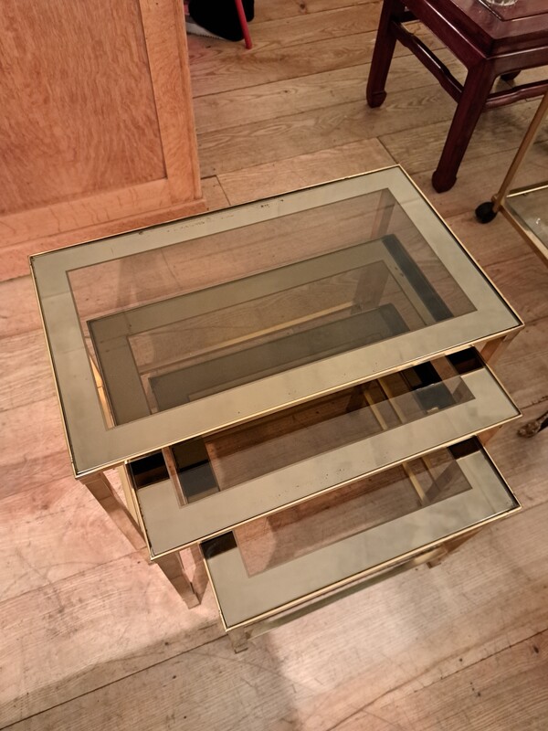 3 nesting tables in gilded brass and smoked mirror glass