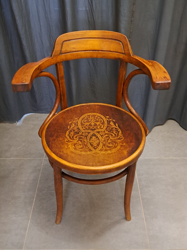 Curved and pyrographed beech wood desk chair of J and J Kohn 