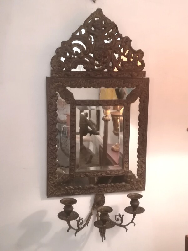 Embossed copper glazing bead mirror with candlesticks