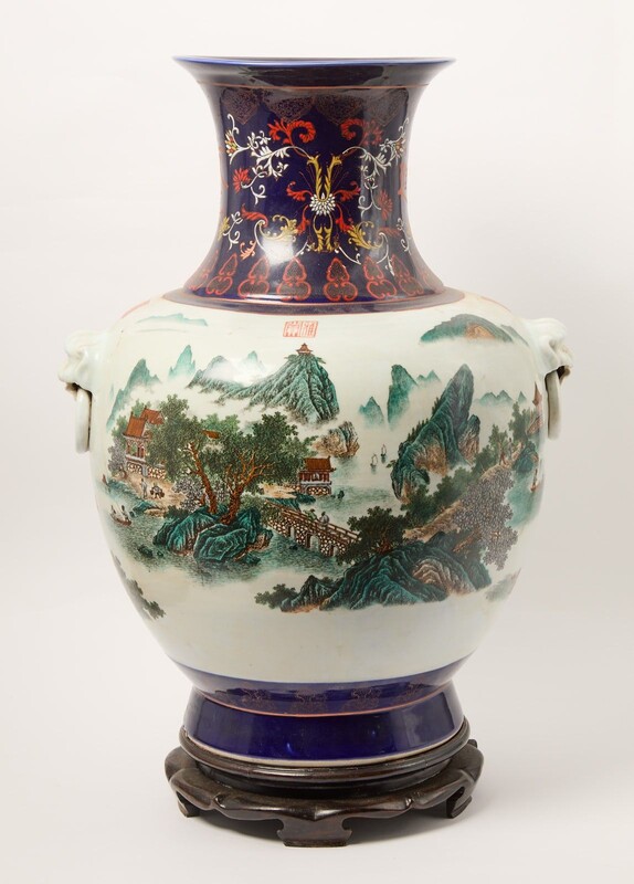 Large Chinese polychrome porcelain vase on wooden base