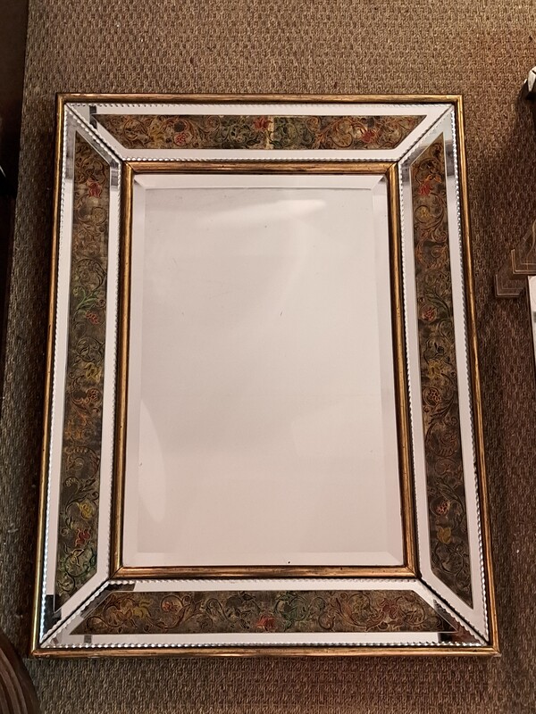 Gilded wood frame eglomised and beveled beaded mirror