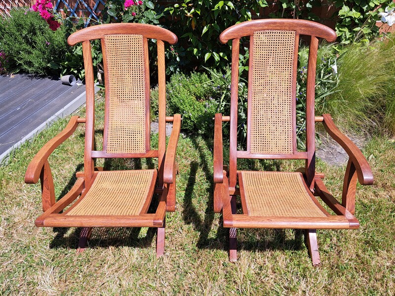 Pair of cane and teak deckchairs