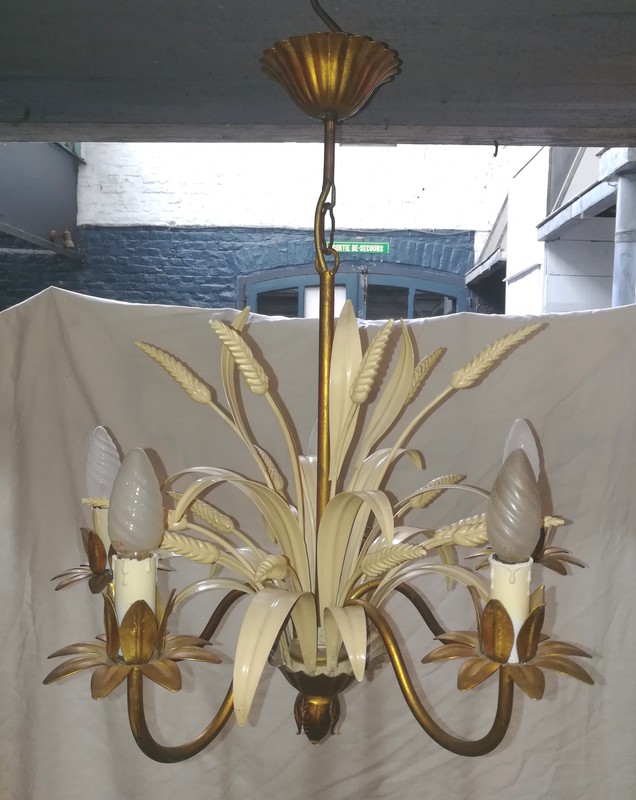 White and gold metal chandelier with wheat ears