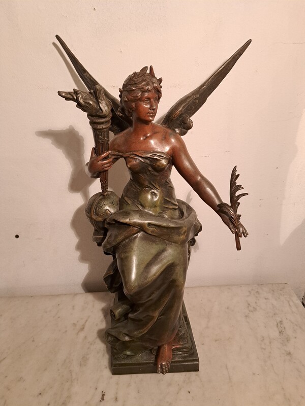 Winged woman sculpture in spelter with double patina signed